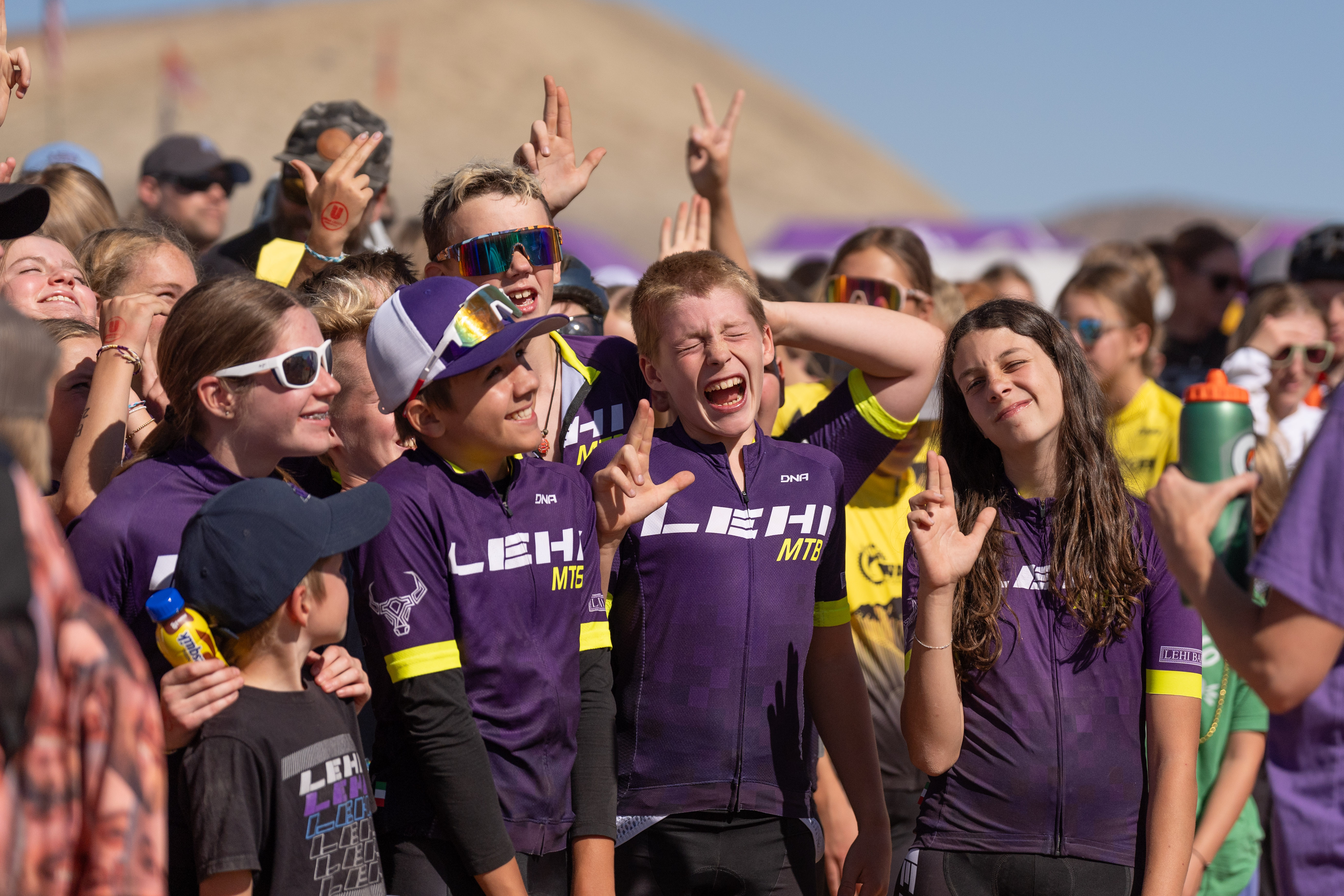 Team riders celebrating after race
